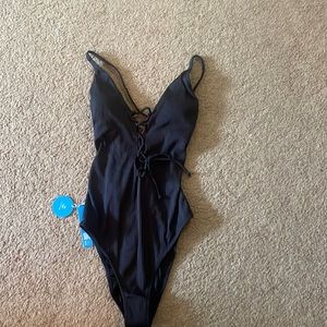 Black ribbed one piece bathing suit